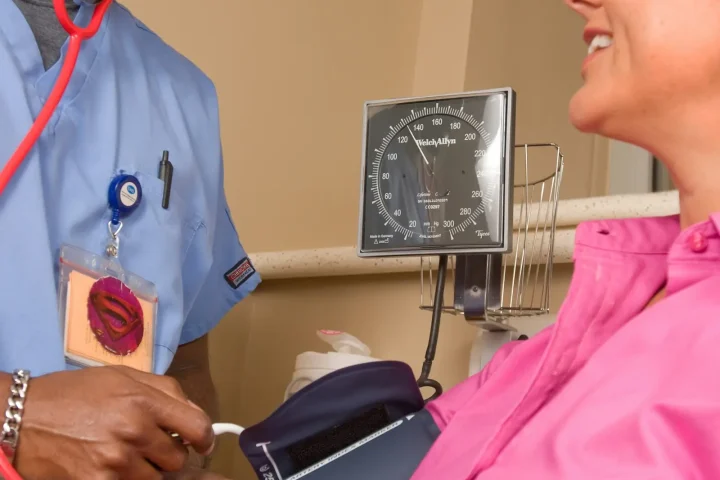 Nurse measuring blood pressure