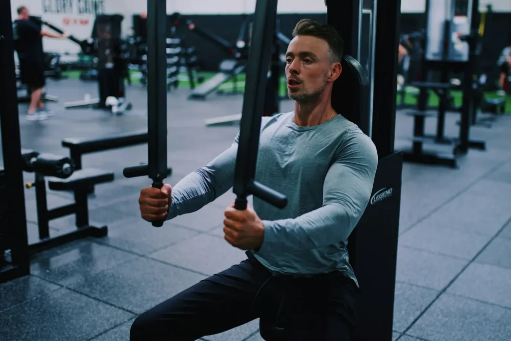Man doing a supervised strength exercise