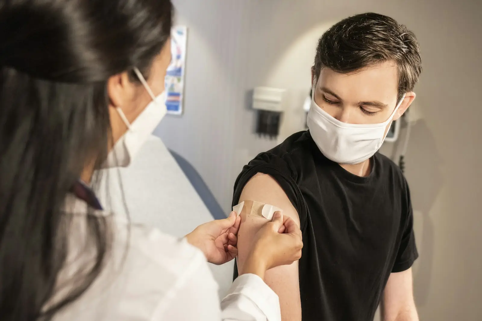 Young man receiving a vaccine